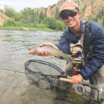 Andrew Dang of Rutgers University poses with a nice trout.