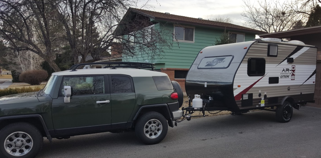 A Toyota FJ Cruiser hooked up to a Starcraft AR One Extreme camper, 2016. 