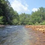 A Pennsylvania creek runs orange with mine pollution.