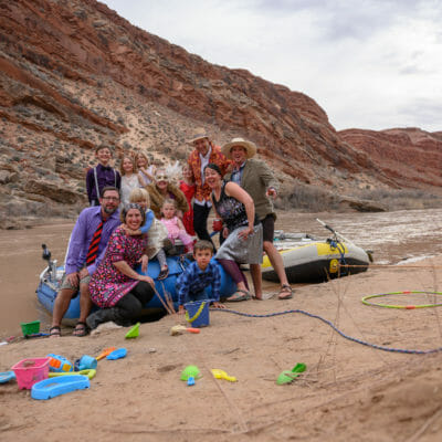 Family and friends raft a western river.