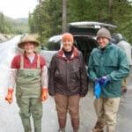 Three college students in Alaska.
