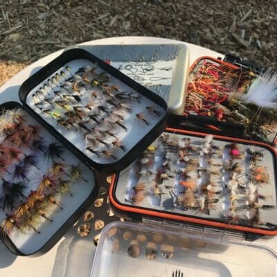 Boxes full of fishing flies.