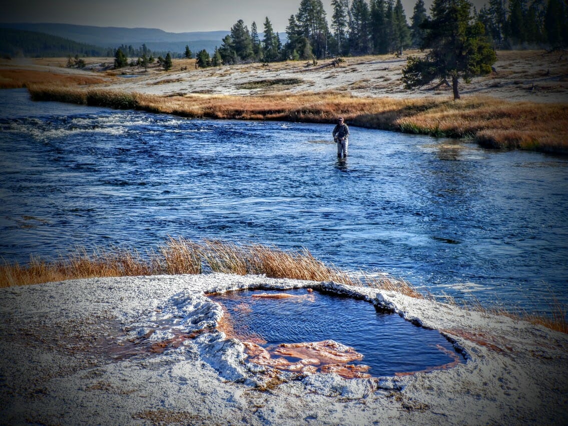 An angler fishes the Firehole River in Yellowstone National Park.