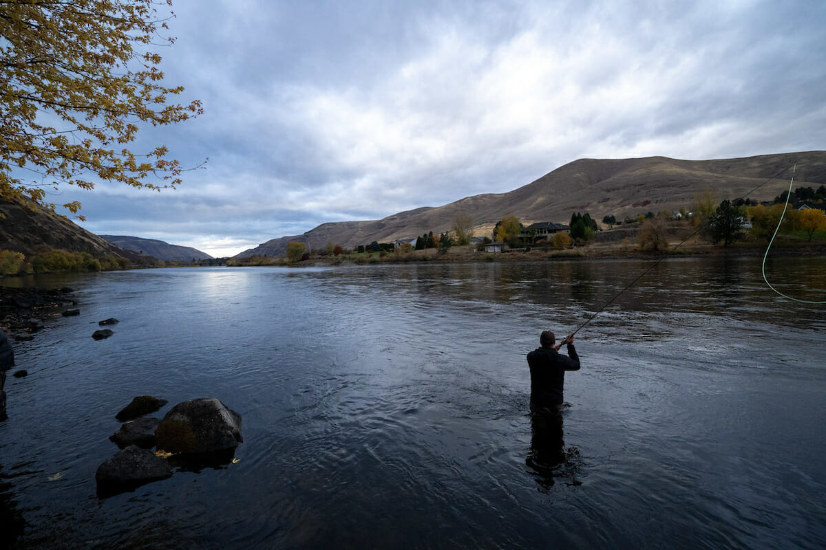 Man fly fishing in the Snake River