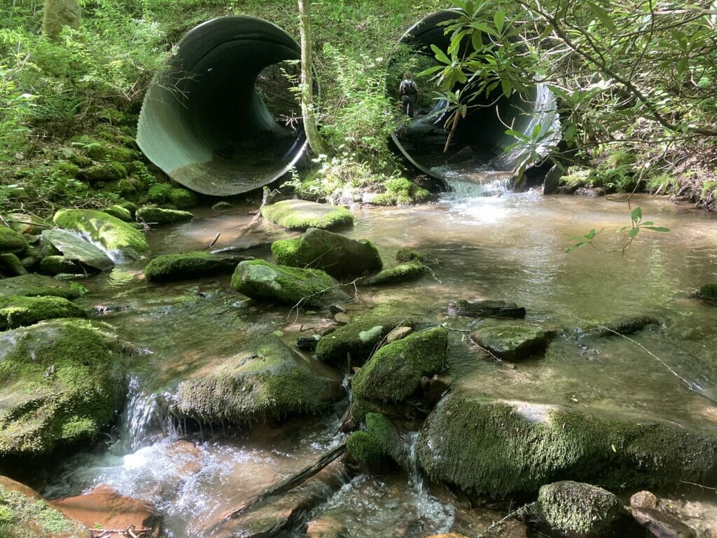 Two culverts with water running through them