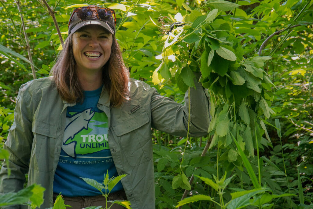 Smiling woman in the woods