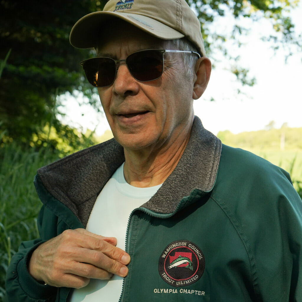 Older man wearing a Olympia TU Chapter jacket