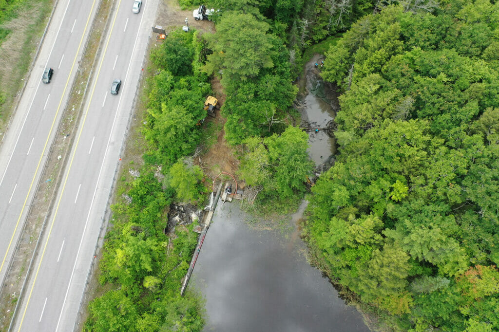 Areal view of Frost Gully Dam being demolished