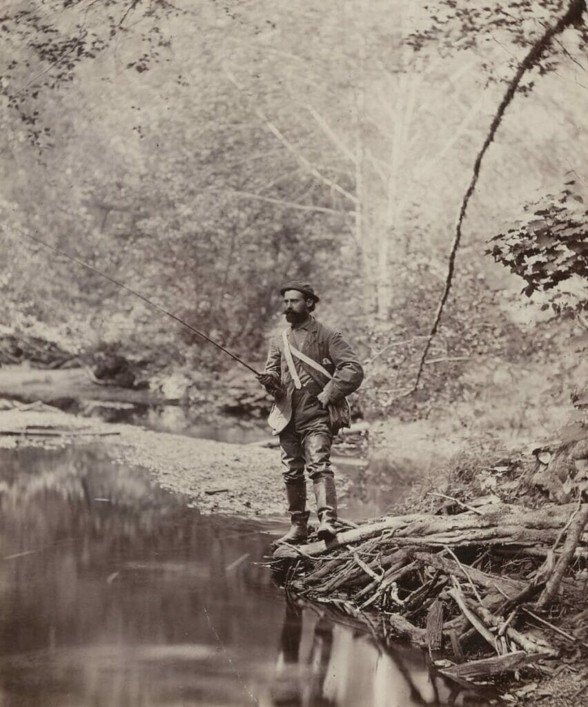 1886 photo of man fishing