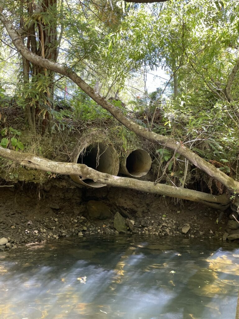 Two culvert next to a stream