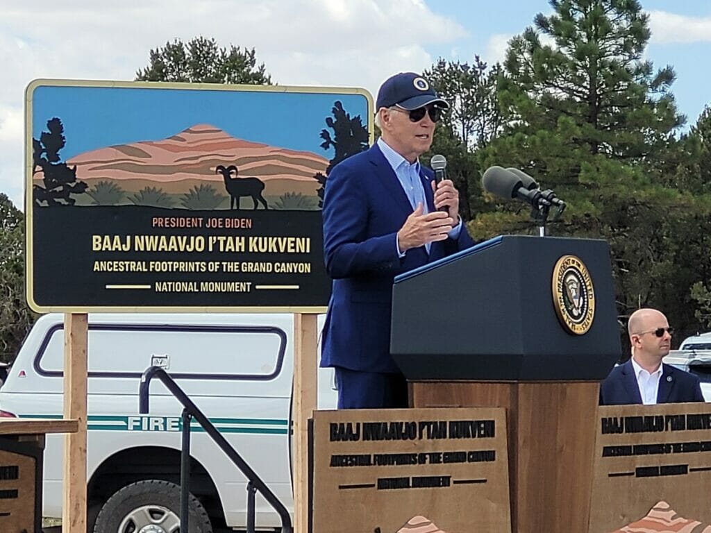 President Biden giving a speech at a podium about the Grand Canyon National Monument