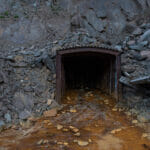 Discolored water coming out of a mine opening