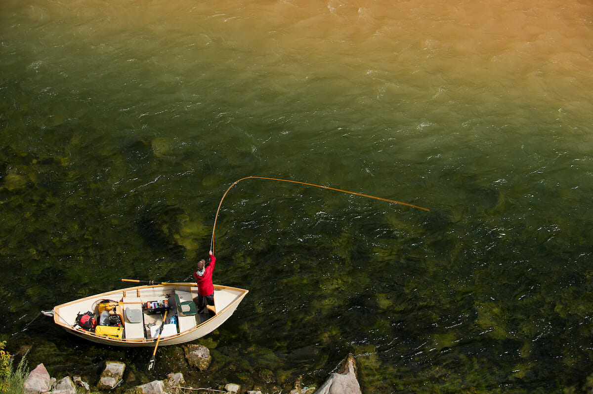 Birds eye view of man casting from a boat