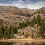 An angler fishing deep in the backcountry.