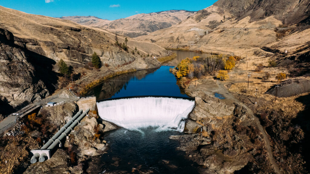 full view of enloe dam with floodgates open