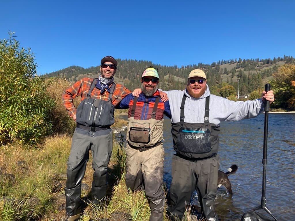 group of three fly fishing friends