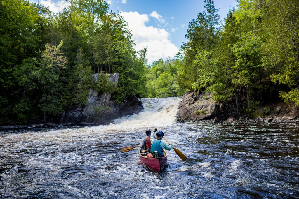 Couple canoeing near LaSalle Falls