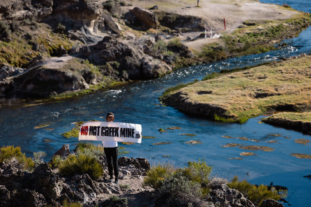 emma markstein with no hot creek mine banner