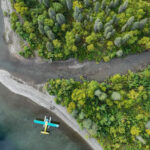 aerial view of plane flying over bristol bay - photo by Fly Out Travel