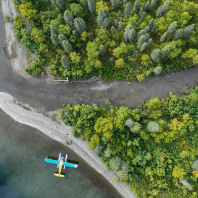 aerial view of plane flying over bristol bay - photo by Fly Out Travel