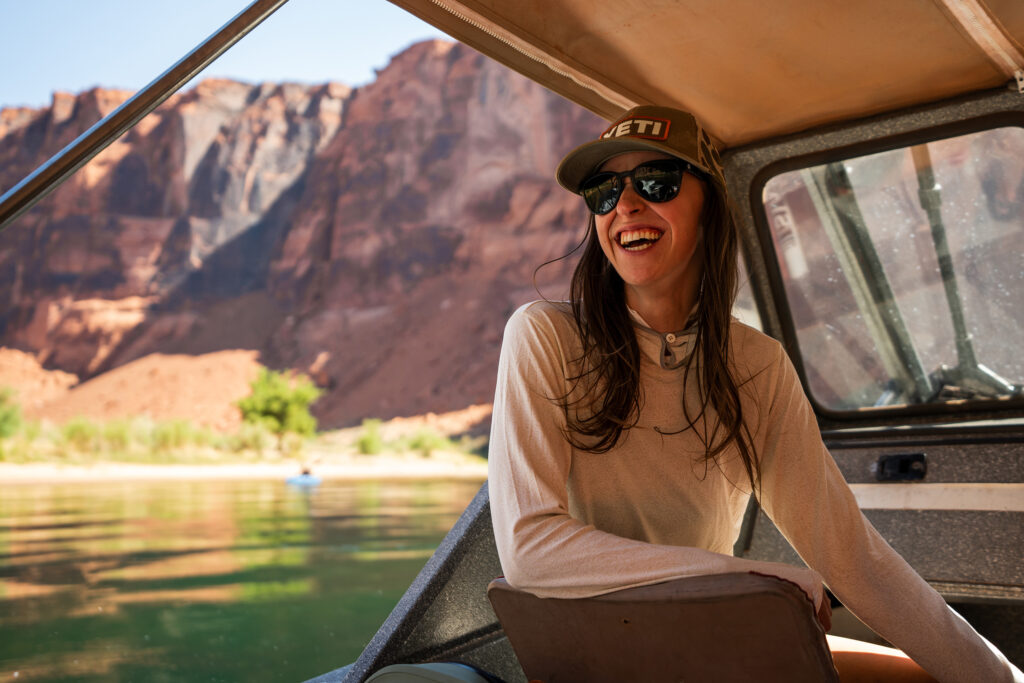 happy angler on boat at Lee's ferry