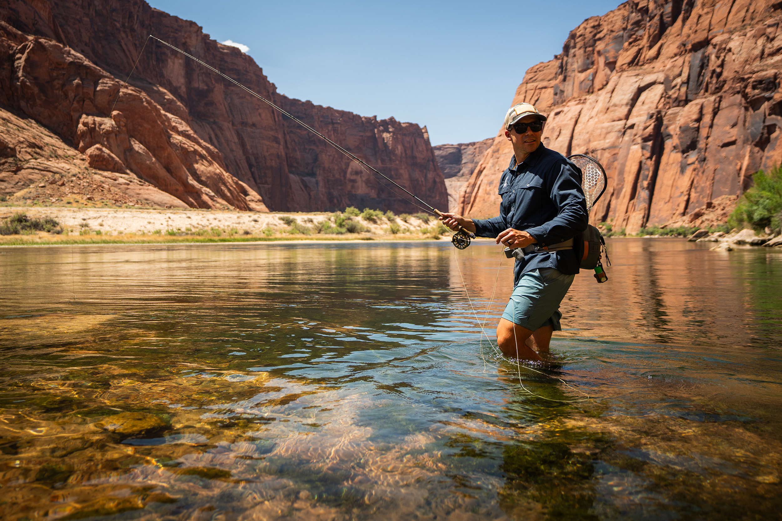 angler fishing lee's ferry in ancestral footprints of the grand canyon national monument