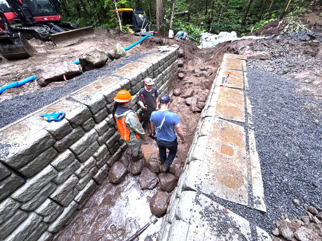 contractor crew standing in progress channel