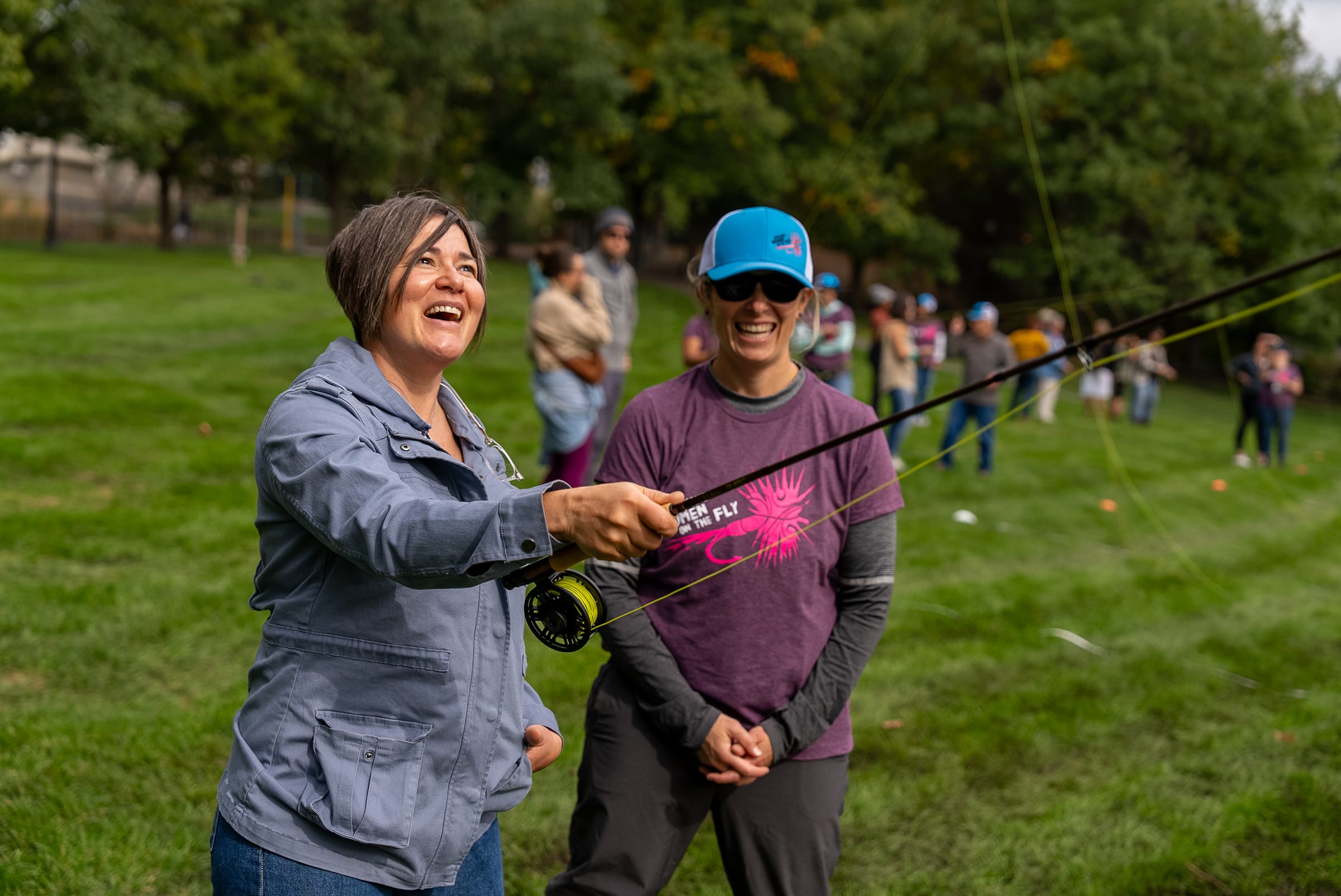 practicing casting fly fishing group