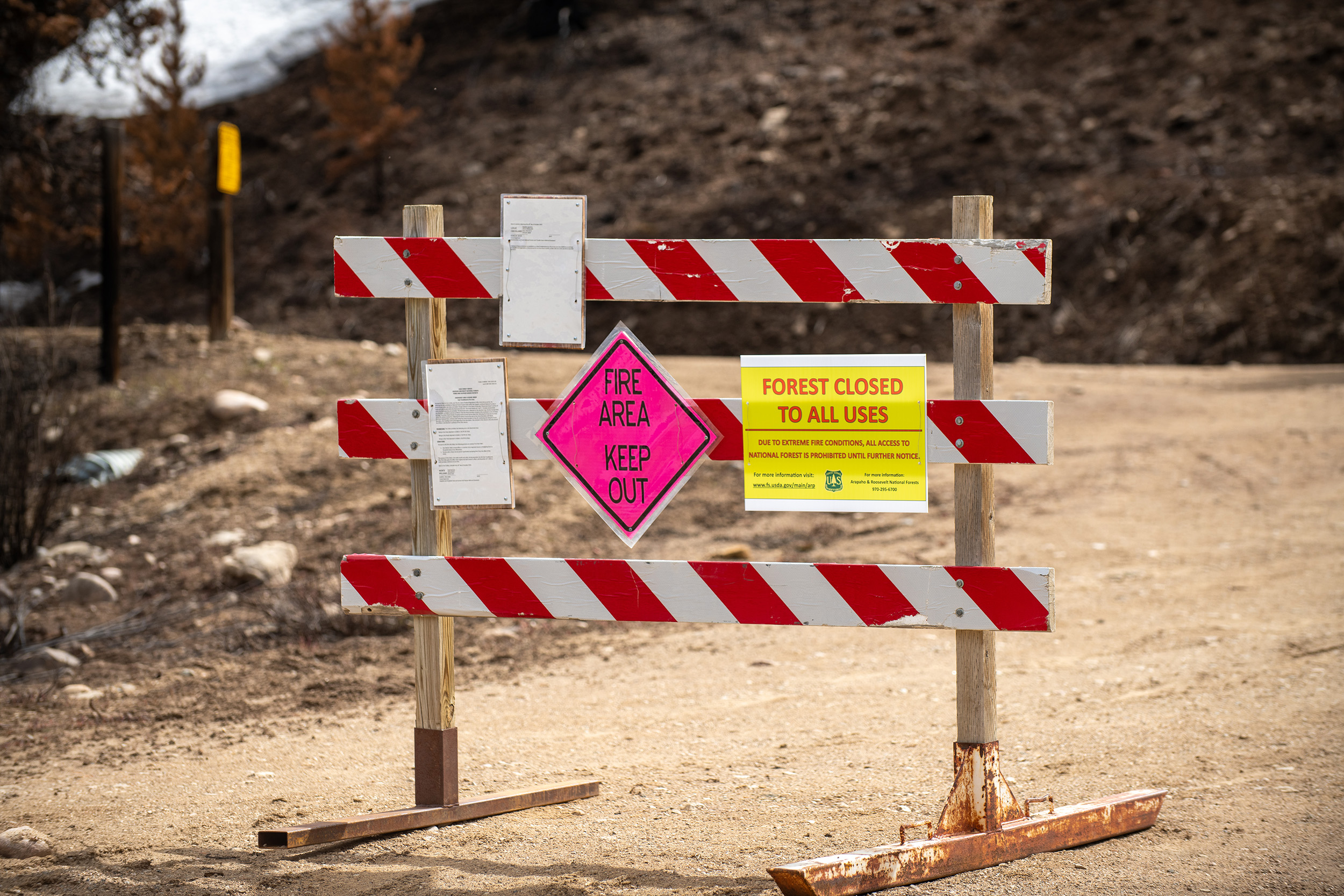 forest closed for wildfire danger fence blocking access