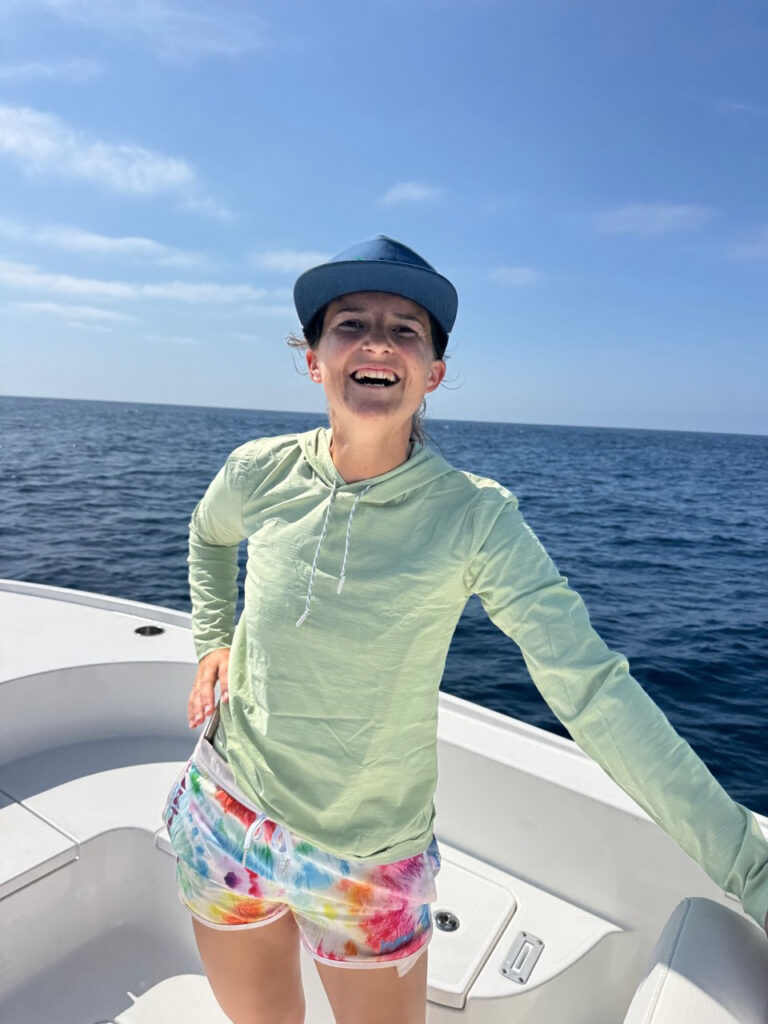 portrait of "Cat" Cathy Feldkamp on boat during mako shark fishing trip