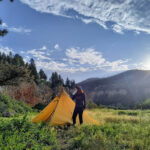 solo backpacker camping in pristine meadow smith river deep creek roadless area
