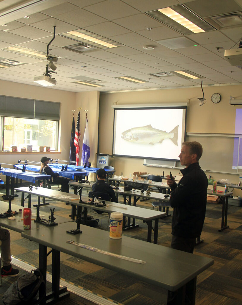 tony lewis giving a presentation at fly camp